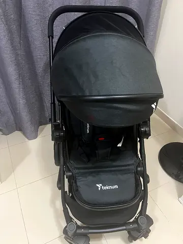 Teknum reversible moonwalk baby stroller in excellent condition