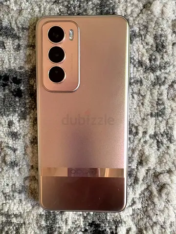 Oppo Reno 12 series phone - used, good condition (rose gold)