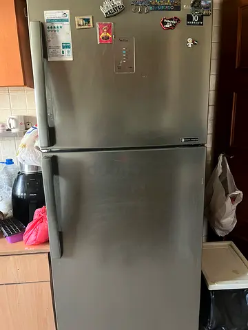 Used double-door stainless steel refrigerator - good working condition