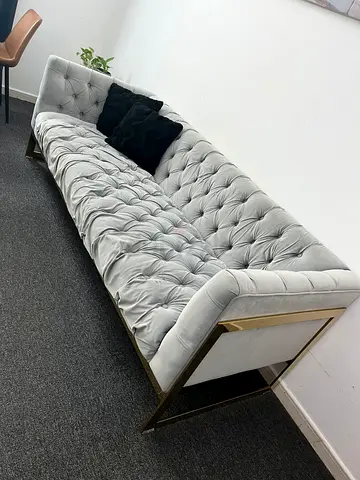 3 seater tufted sofa