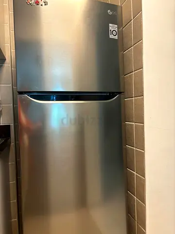 LG Stainless Steel Top Freezer Refrigerator - Good Condition