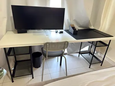 Long white and black study desk with shelving — great condition as new