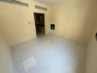 Exclusive offer: Spacious studio apartment for annual rent in Ajman Corniche area, AED 15,000 payable in 4 installments.