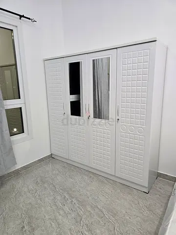 Brand New White 4-Door Wardrobe with Mirror