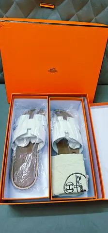 Brand new Hermes-style white leather slide sandals in original box