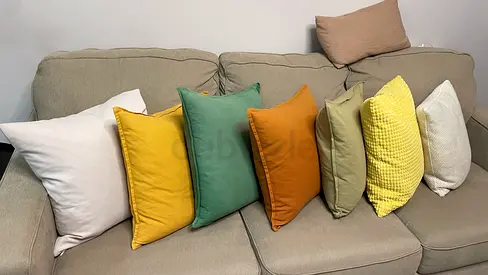 7 Assorted Throw Cushions