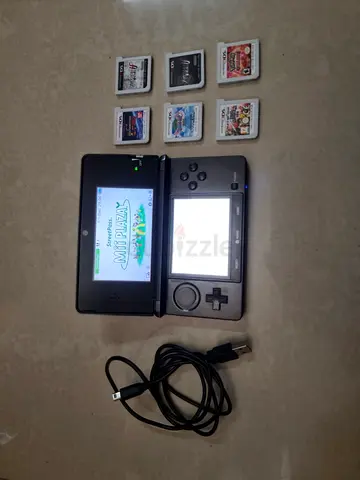 Nintendo 3ds with 6 game card