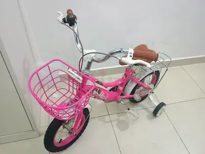 Pink Kids Bicycle with Training Wheels and Front Basket - Good Condition