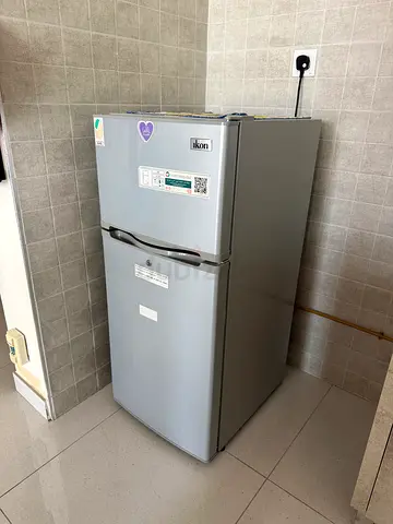 Used Silver Double-Door Refrigerator - Good Working Condition