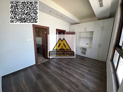 Two-bedroom apartment with a master living room for rent in Al Jurf 3, Ajman, with central air conditioning, a balcony, a spacious layout, and a prime