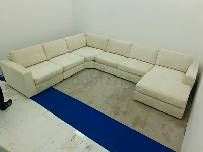 Great condition home center beige color Ushape sofa