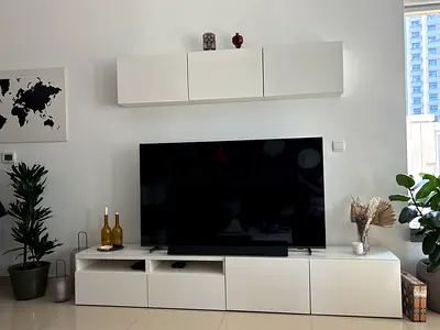 Minimalist White TV Entertainment Unit with Wall Cabinets