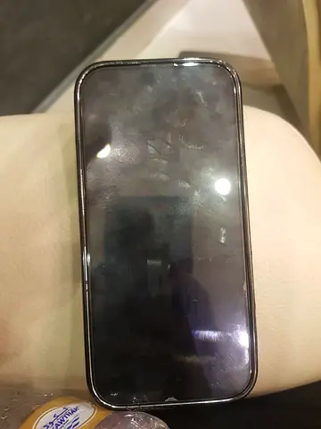 iPhone with screen protector — good working condition