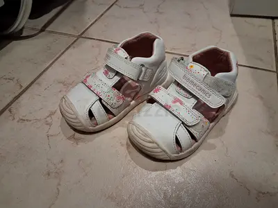 Each pair 75 aed,White toddler Biomecanics sandals, lightly used
