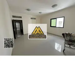 Large studio in Al Nuaimiya 1, Ajman. Separate kitchen, central AC, prime location near Al Hikma Sch