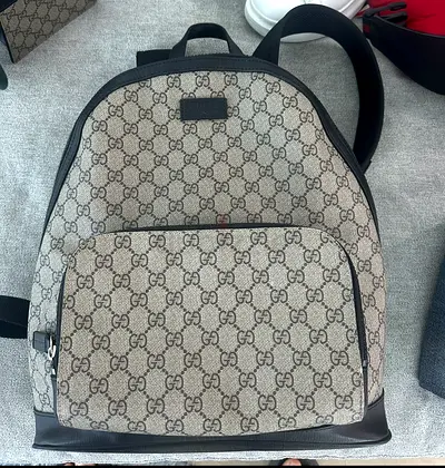 Gucci beige GG monogram backpack — good used condition