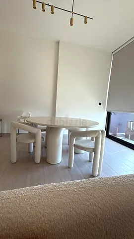 Modern Sculptural Dining Table with 4 Chairs — Neutral Tone