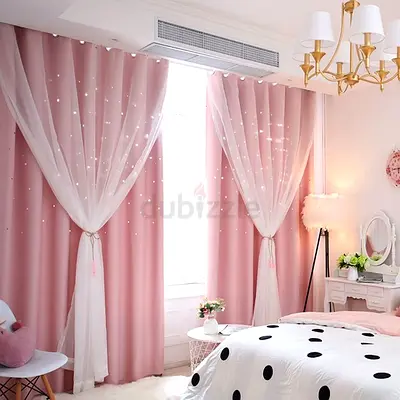 Pink blackout curtains with sheer star-pattern panels — pair
