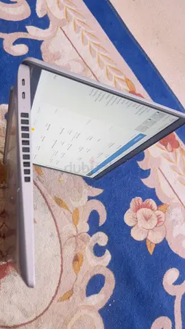 Silver laptop - good working condition, light wear