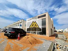 A strong investment opportunity to own a commercial property in a strategic location Al Zahia main m