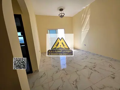 Al Jurf 2 apartment, one bedroom and living room, master, 2 bathrooms, balcony, free parking, comfortable space and practical layout, prime location n