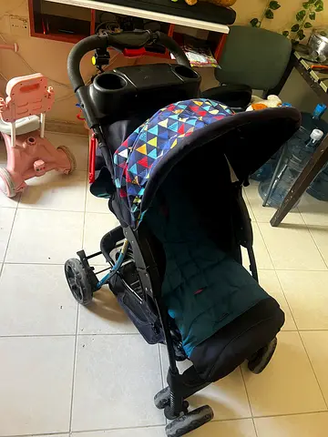 Baby stroller with canopy and cup holders