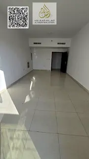 Three-bedroom apartment with a living room and storage room for annual rent in Ajman