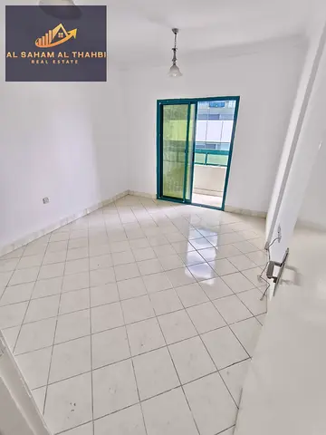 One-bedroom apartment with a balcony for rent in Al Mamzar