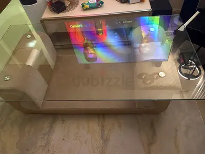 Glass Top Coffee Table with Curved Beige Base - Good Condition