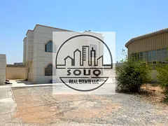 Spacious 6-bedroom villa with swimming pool and sitting area.