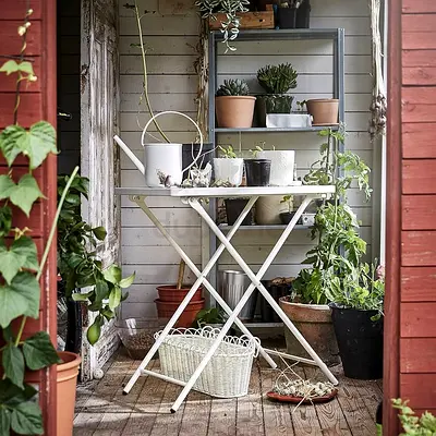 Foldable White Metal Table (indoor or outdoor) - Good Condition