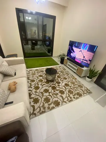 Beige and Brown Floral Area Rug - Good Condition