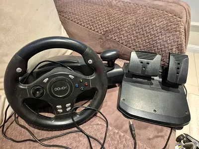 Steering wheel with pedals