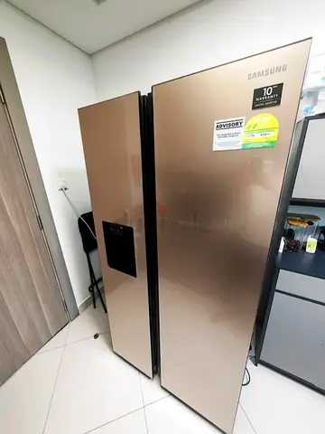 Samsung Side-by-Side Refrigerator with Water Dispenser - Good Condition