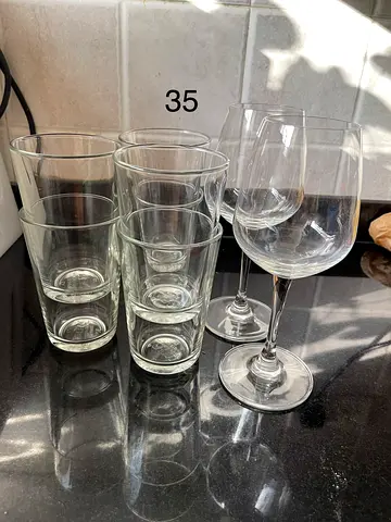 Set of clear drinking glasses and wine glasses (6 tumblers + 2 wine) - used but in good condition
