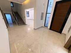 Brand new villa, first occupancy, in Al Zahia, close to all public and commercial services, easy acc