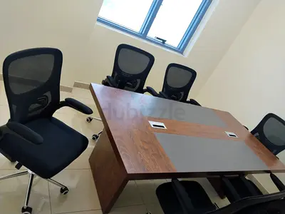Wooden conference table with 6 ergonomic mesh chairs - good condition