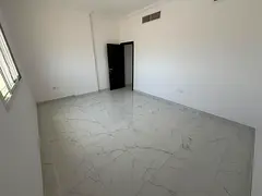 One of the finest apartments in Ajman for annual rent, 2-bedroom apartment with living room in Al Ju