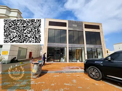 صالة عرض الزهية مع موقف سيارتين