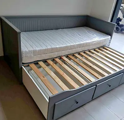 IKEA Hamnes Day bed with 3 storage drawers underneath and with 2 IKEA mattresses is available in