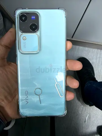 Vivo smartphone (light blue) with clear protective case - good condition