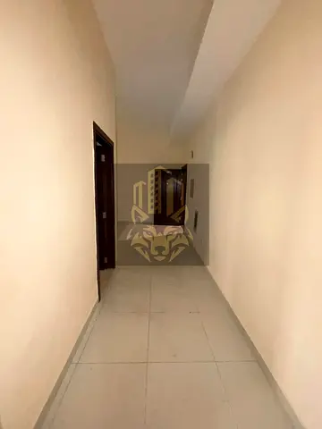 شقة غرفة وصالة للإيجار في المويهات 1 | موقع مميز قرب شارع الشيخ عمار | 30,000 درهم