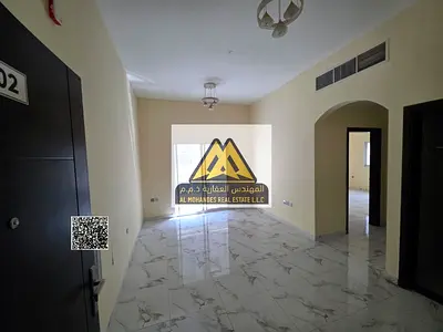 Al Jurf 2 apartment, one bedroom and living room, master, 2 bathrooms, balcony, free parking, 32,000 yearly, 4 payments, prime location, close to serv