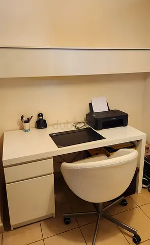 White Office Desk with Storage Drawer, overhead cabinet and Cream Swivel Chair - Good Condition