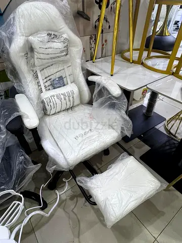 White ergonomic office chair with footrest and light