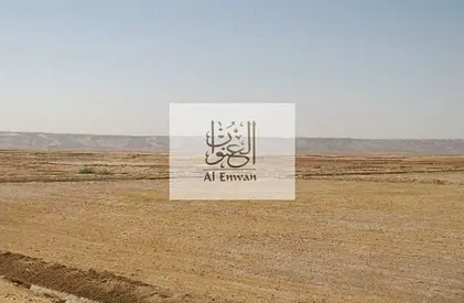 Corner land for sale in Al-Hawshi