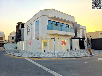 Luxury corner villa in Al Bahia with a modern design, distinctive spaces, and registration fees included.