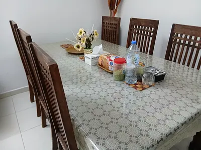 Heavy wooden dinning table with 6 chairs