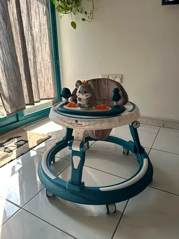 Baby walker / jumper with seat and activity tray - good condition