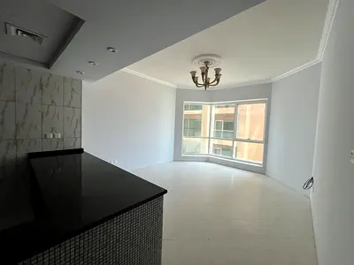 One-bedroom apartment with American kitchen, free AC, gym, and pool in Al Majaz 3